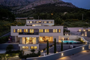 Luxury, seafront Villa Petra with heated pool only 50m from beach